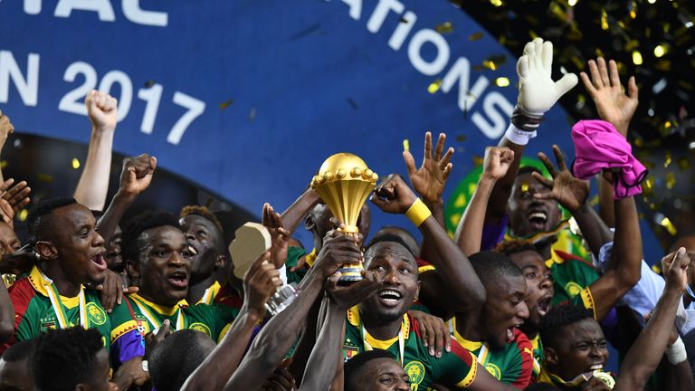 The Cameroon football team celebrate with the winner's trophy after beating Egypt 2-1 to win the 2017 Africa Cup of Nations final football match between Eg