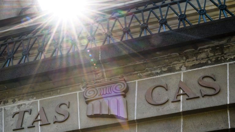 This picture taken on July 21, 2016 shows the sign of the Court of Arbitration for Sport (CAS) as the sun appears at its headquarters in Lausanne.
The Cour