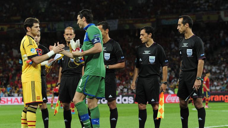 KIEV, UKRAINE - JULY 01:  Gianluigi Buffon (R) of Italy shakes hands with  Iker Casillas of Spain next to the match officials before the UEFA EURO 2012 fin
