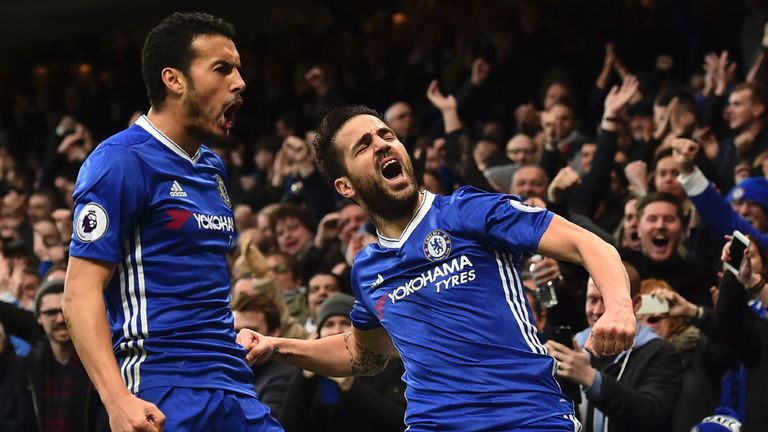 Chelsea's Spanish midfielder Cesc Fabregas (R) and Chelsea's Spanish midfielder Pedro (L) celebrate after Fabregas scored the opening goal during the Engli