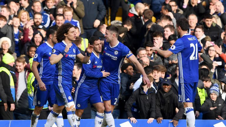 LONDON, ENGLAND - FEBRUARY 04:  Eden Hazard of Chelsea celebrates with uteam-mates after scoring his team's second goal during the Premier League match bet