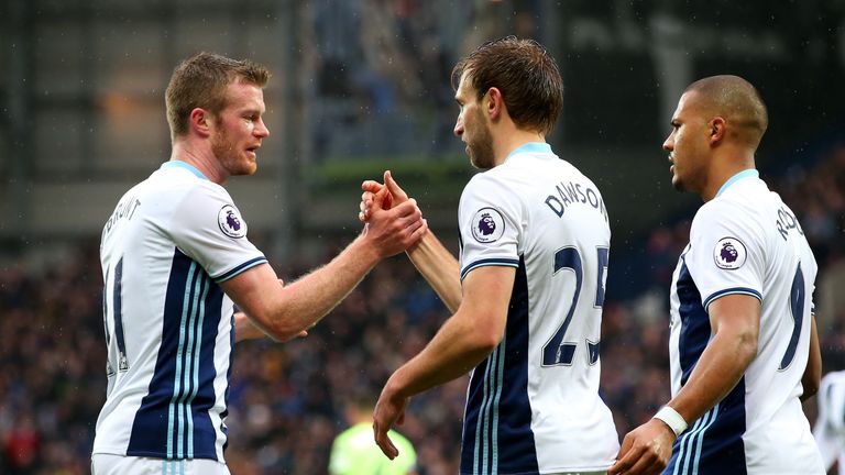 WEST BROMWICH, ENGLAND - FEBRUARY 25: Craig Dawson of West Bromwich Albion (C) celebrates scoring his sides first goal with Chris Brunt of West Bromwich Al