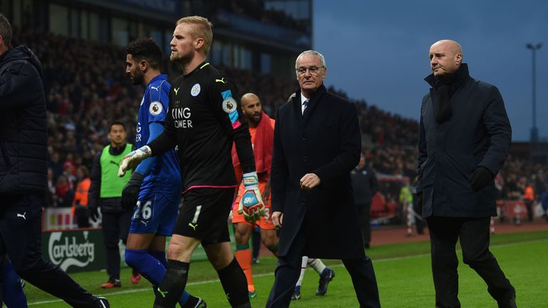Leicester City's Italian manager Claudio Ranieri (2R) leaves the pitch after remonstrating with the referee at half-time during the English Premier League 