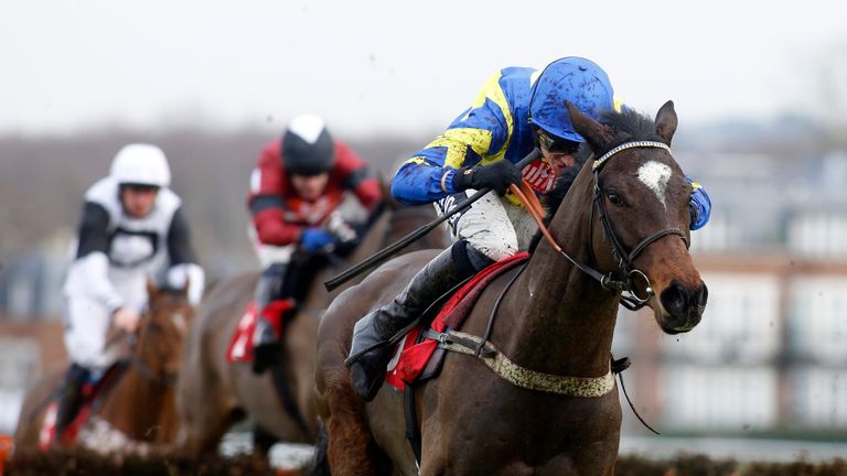 Coeur De Lion and Tom Cannon on their way to victory in the Betfred 'Home Of Goals Glore" Novices' Hurdle at Sandown.