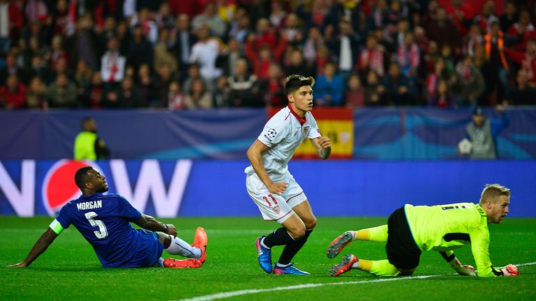 Sevilla's Argentinian midfielder Joaquin Correa (C) celebrates after scoring a goal during the UEFA Champions League round of 16 second leg football match 