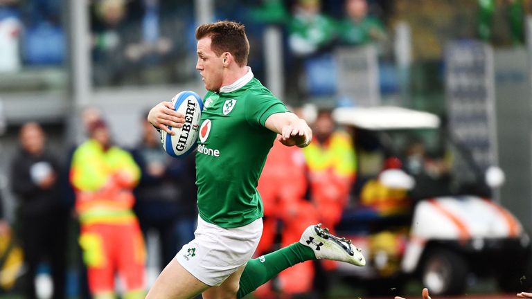 Ireland's Craig Gilroy scores a try during the team's Six Nations rugby union match Italy against Ireland at the Olympic Stadium in Rome on February 11, 20