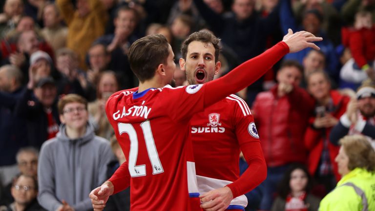 MIDDLESBROUGH, ENGLAND - FEBRUARY 18: Cristhian Stuani of Middlesbrough (R) celebrates scoring his sides third goal with Gaston Ramirez of Middlesbrough (L