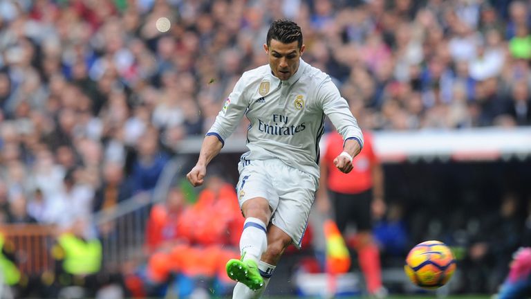Real Madrid's Cristiano Ronaldo takes a free kick 