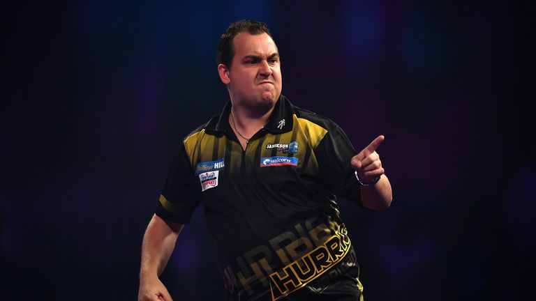Kim Huybrechts of Belgium reacts during his first round match against James Wilson of England