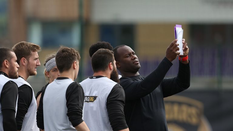 David Garrard coaches the quarterbacks at last year's camp