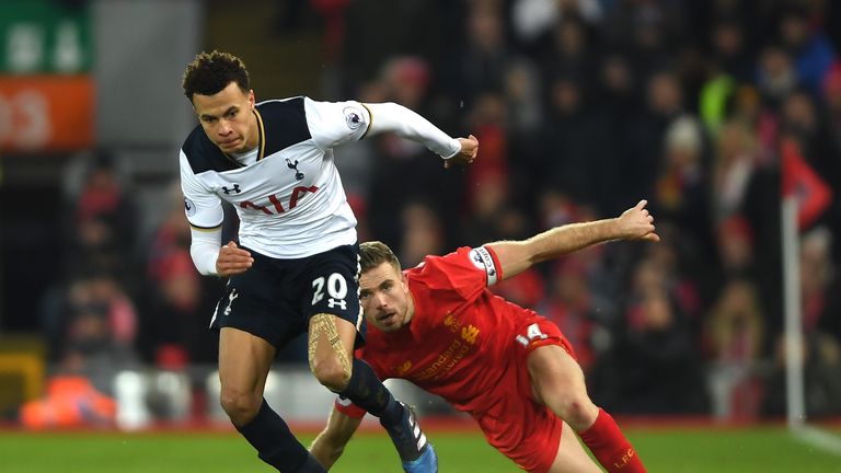 Spurs' Dele Alli goes past Liverpool midfielder Jordan Henderson