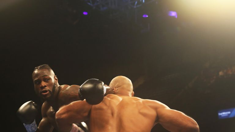 Deontay Wilder and Gerald Washington in action during their WBC World Heavyweight title fight