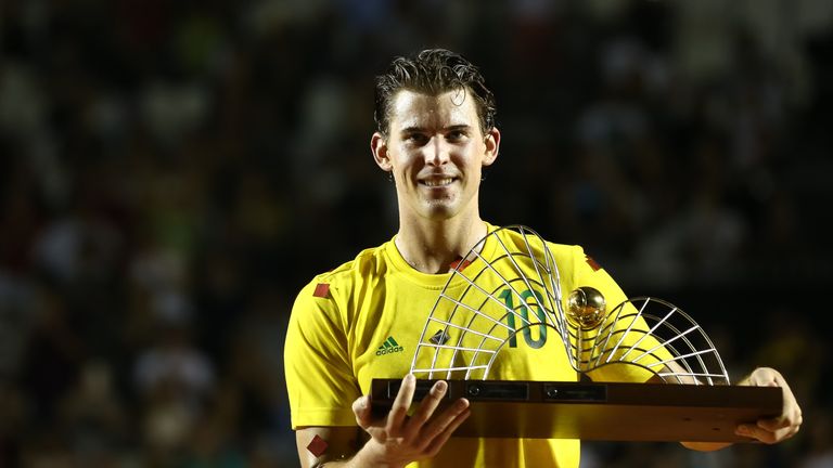 RIO DE JANEIRO, BRAZIL - FEBRUARY 26: Dominic Thiem of Austria raises his trophy after defeating Pablo Carreno Busta of Spain during the Final of the ATP R
