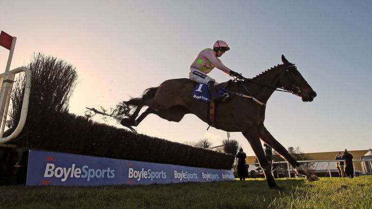 Douvan ridden by Ruby Wlash jumps the last to win The BoyleSports Tied Cottage Steeplechase  during BoyleSports Tied Cottage Chase Day at Punchestown Racec