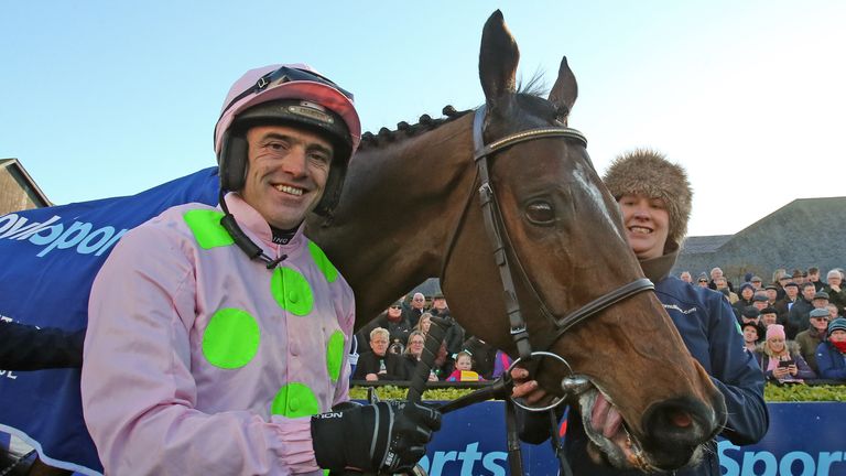 Douvan and Ruby Walsh celebrate success in the 2017 Tied Cottage Chase at Punchestown.