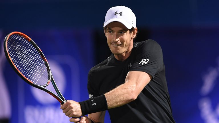 Andy Murray returns a shot during his match against Malek Jaziri