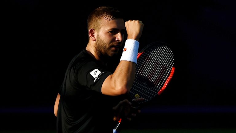 Dan Evans celebrates a point during his match against Dustin Brown