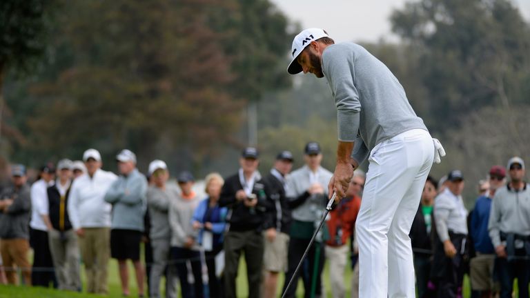 PACIFIC PALISADES, CA - FEBRUARY 16: Dustin Johnson putts on the fourth green during the first round at the Genesis Open at Riviera Country Club on Februar