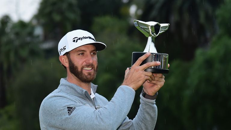 PACIFIC PALISADES, CA - FEBRUARY 19:  Dustin Johnson poses with the trophy during the final round at the Genesis Open at Riviera Country Club on February 1