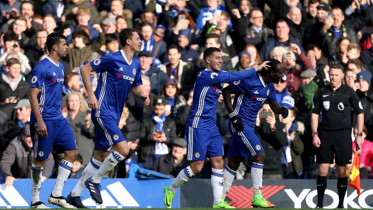 Eden Hazard celebrates with team-mates after putting Chelsea 2-0 up