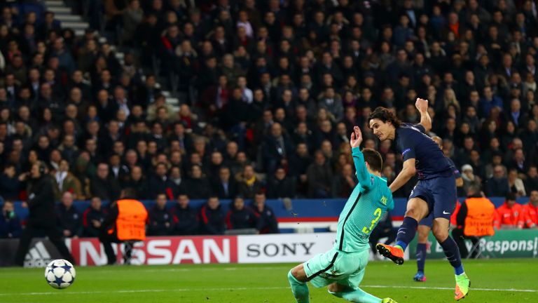 PARIS, FRANCE - FEBRUARY 14:  Edinson Cavani of Paris Saint-Germain scores his team's fourth goal during the UEFA Champions League Round of 16 first leg ma