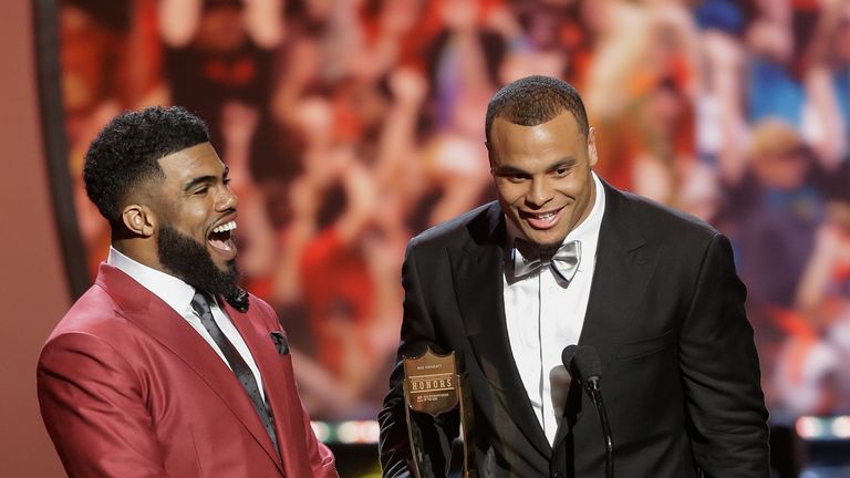 HOUSTON, TX - FEBRUARY 04:  Quarterback Dak Prescott, right, excepts the AP  Offensive Rookie of the Year with this teammate Ezekiel Elliot during the NFL 