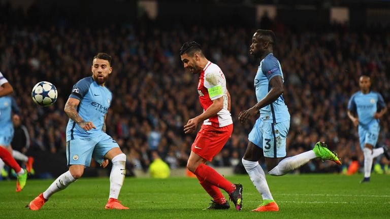 MANCHESTER, ENGLAND - FEBRUARY 21:  Radamel Falcao Garcia of AS Monaco (C) scores their third goal during the UEFA Champions League Round of 16 first leg m