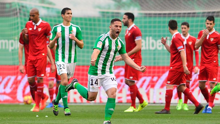Betis' Danish defender Riza Durmisi (C) scored the opening goal against Sevilla