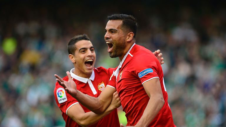 Gabriel Mercado (R) celebrates as Sevilla move level at the top with Real Madrid
