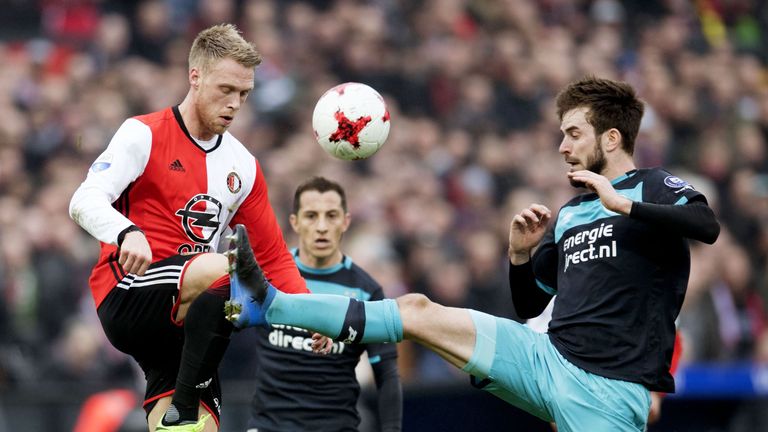 Feyenoord's Danish forward Nicolai Jorgensen (L) and PSV's midfielder Davy Proepper go for the ball during the Dutch Eredivisie fottball match Feyenoord Ro