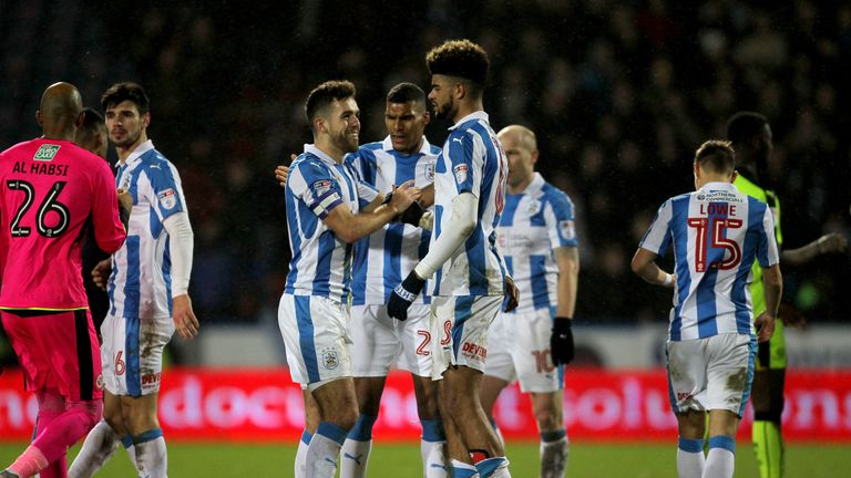 Huddersfield Town's Tommy Smith celebrates with Philip Billing after the Sky Bet Championship match v Reading at the John Smith's Stadium, Huddersfield