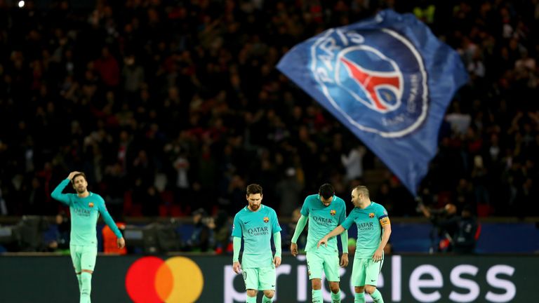 Sergio Busquets, Lionel Messi, Andres Iniesta, Luis Suarez of Barcelona react after conceding a goal during the UEFA Champions League tie v PSG