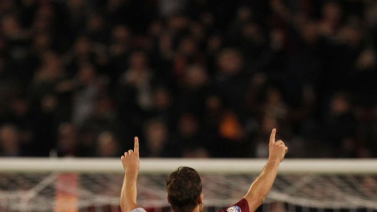 Francesco Totti of AS Roma celebrates after scoring the winner