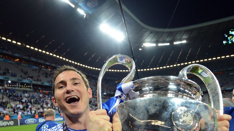 Frank Lampard celebrates with the Champions League trophy after defeating Bayern Munich on penalities