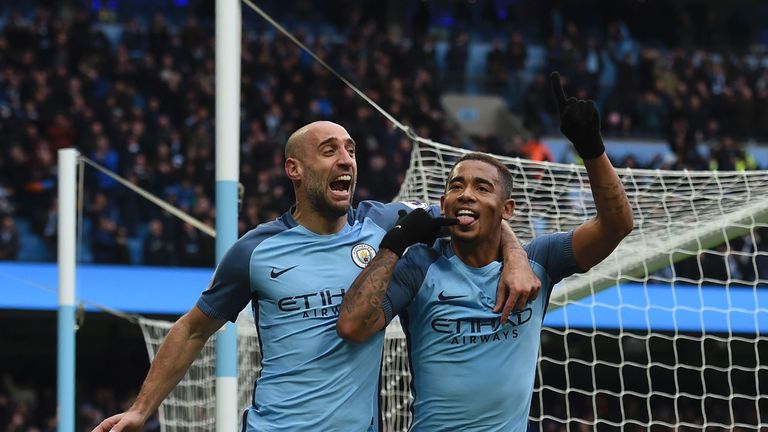 Manchester City's Brazilian striker Gabriel Jesus (R) celebrates with Manchester City's Argentinian defender Pablo Zabaleta after scoring their late winnin