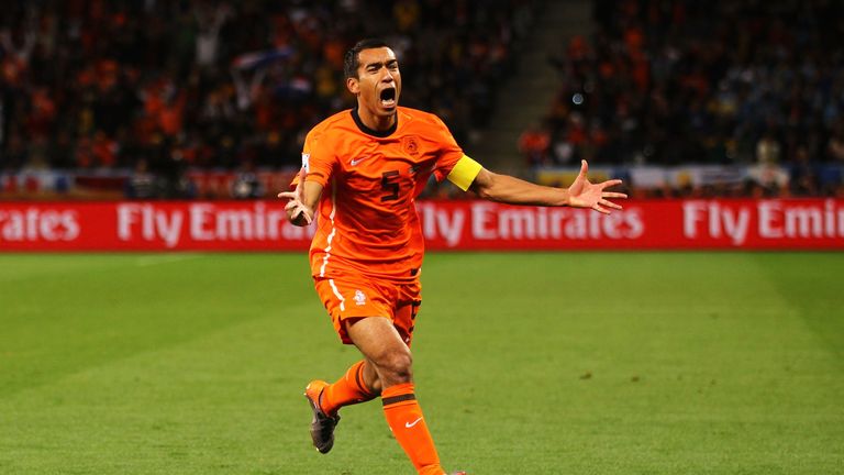 Giovanni van Bronckhorst celebrates scoring for the Netherlands in their 2010 World Cup semi-final