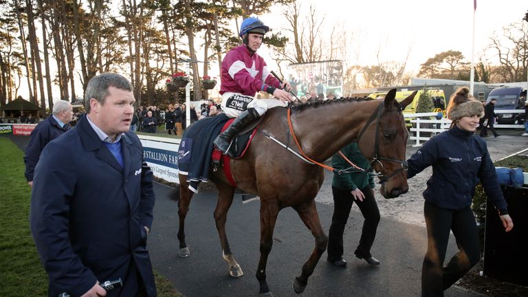 Outlander with trainer Gordon Elliott and jockey Jack Kennedy in the parade ring after winning The Lexus Steeplechase during day three of the Christmas Fes