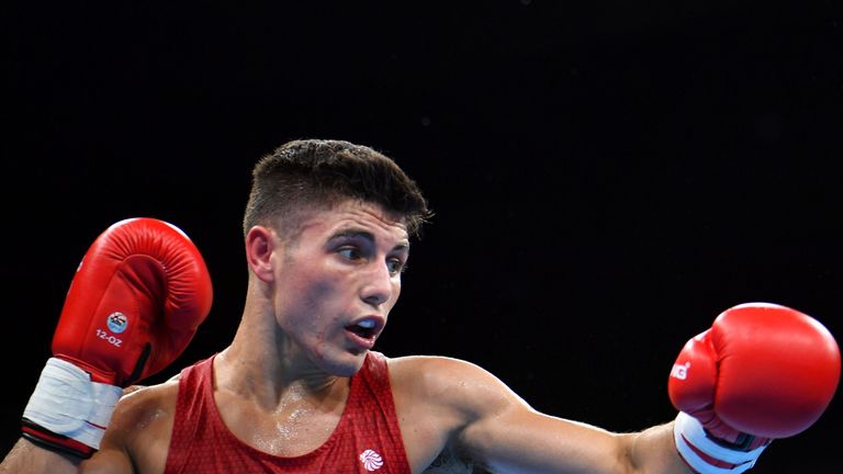Great Britain's Josh Kelly fights Egypt's Walid Mohamed (UNSEEN) during the Men's Welter (69kg) match at the Rio 2016 Olympic Games at the Riocentro - Pavi
