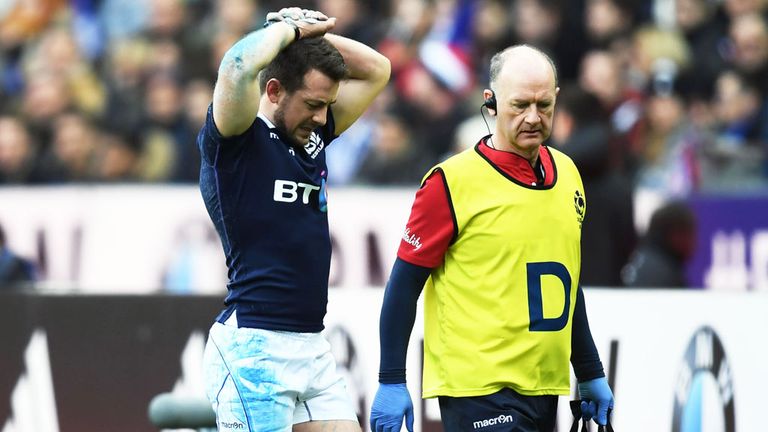 Greig Laidlaw leaves the pitch in France after suffering his injury