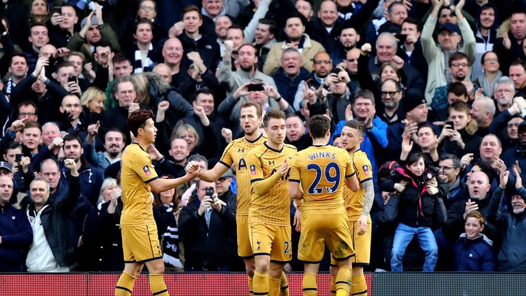 LONDON, ENGLAND - FEBRUARY 19:  Harry Kane of Tottenham Hotspur (2L) celebrates with team mates as he scores their second goal during The Emirates FA Cup F