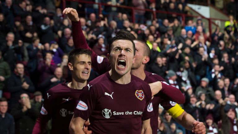 Hearts' Don Cowie celebrates after putting the home side 3-1 in front