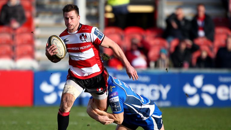 GLOUCESTER, ENGLAND - FEBRUARY 04: Henry Trinder of Gloucester is tackled by Tom Prydie of Newport Gwent Dragons during to the Anglo-Welsh Cup match betwee