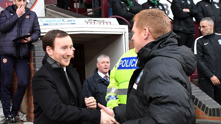 Hearts head coach Ian Cathro shakes hands with Hibernian manager Neil Lennon