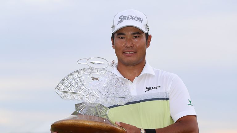 Hideki Matsuyama poses with the trophy after winning the Waste Management Phoenix Open 