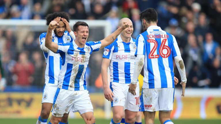 Huddersfield Town's Jonathan Hogg (left) celebrates with Christopher Schindler after the Sky Bet Championship match at the John Smith's Stadium, Huddersfie