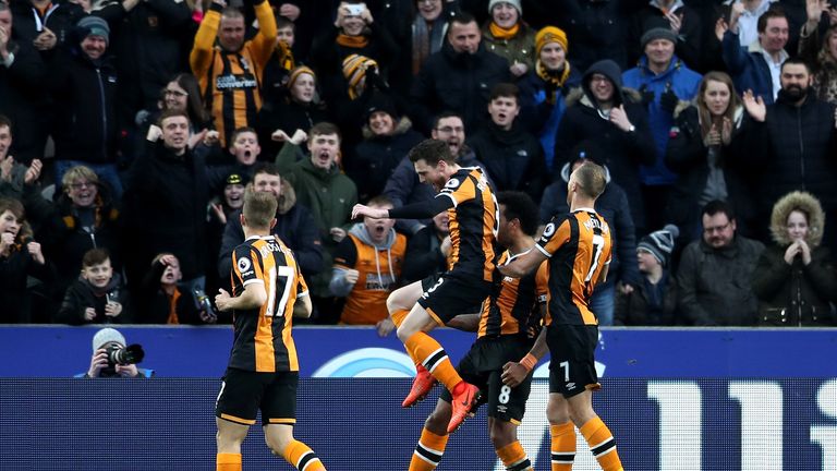 Tom Huddlestone (centre) celebrates his goal