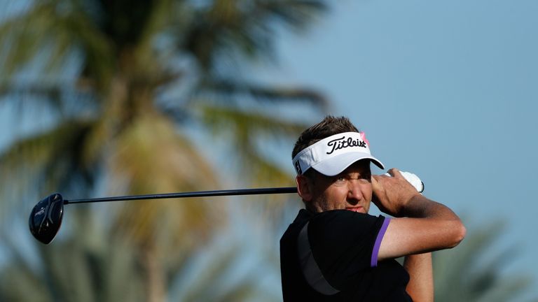 DUBAI, UNITED ARAB EMIRATES - FEBRUARY 04:  Ian Poulter of England tees off on the 13th hole during the completion of the weather delayed second round of t