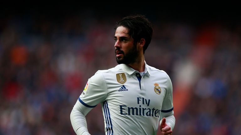 MADRID, SPAIN - FEBRUARY 18: Francisco Roman Alarcon alias Isco (R) looks on during the La Liga match between Real Madrid CF and RCD Espanyol at Estadio Sa