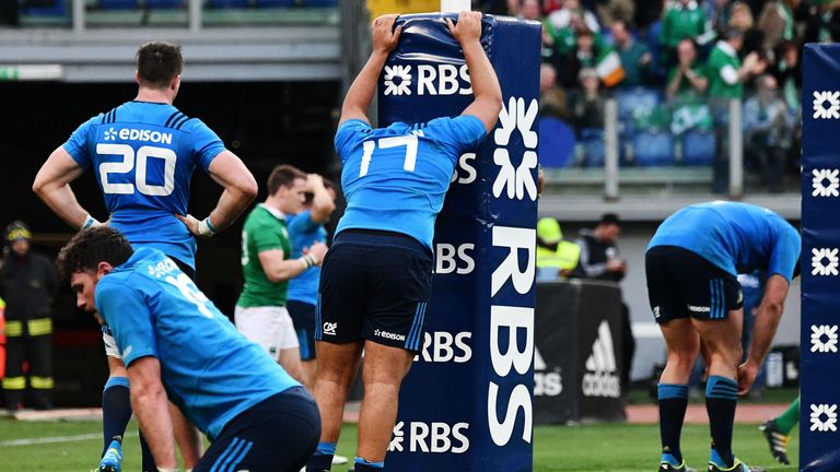 Italian players react after Ireland's Craig Gilroy scored a try during the team's Six Nations rugby union match between Italy and Ireland 11/02/2017