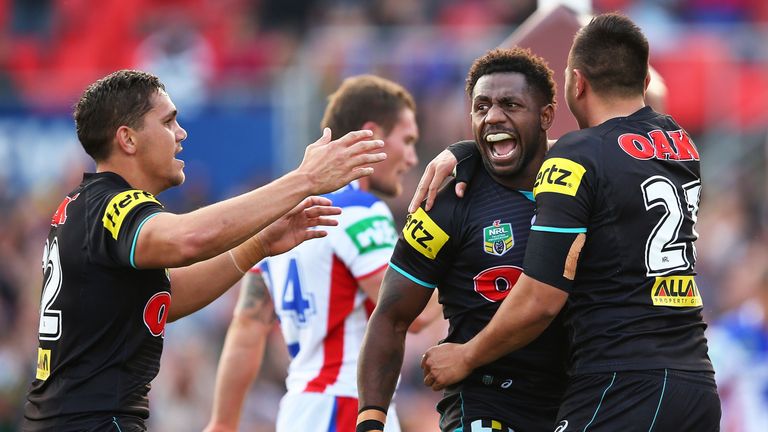 SYDNEY, AUSTRALIA - SEPTEMBER 05 2016:  Dean Whare of the Panthers celebrates with team mate, James Segeyaro after scoring a try